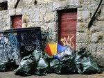 Excess Junk by Dumpster